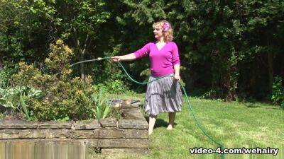 Rogue Rose waters the garden and her hairy bush - hotmovs.com - Britain