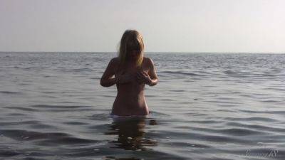 Divine Blonde Teen Blissfully Naked in the Sea - txxx.com