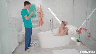 Inked MILF welcomes horny stepson into the tub for some sex fun - xbabe.com